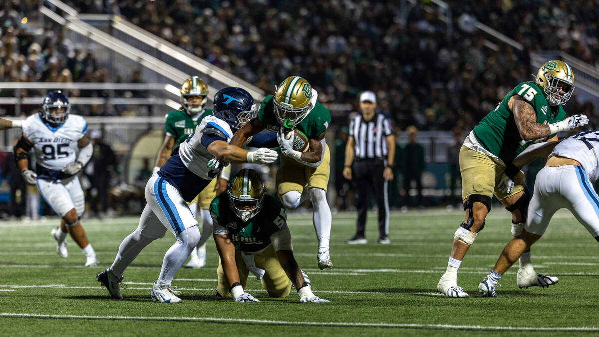 Cal Poly running back Jaden Green rushes for the end zone against the San Diego Toreros at Mustang Memorial Field on Sept. 19, 2026. The Mustangs lost to the Toreros 38-35 on Homecoming night on a last-minute field goal.